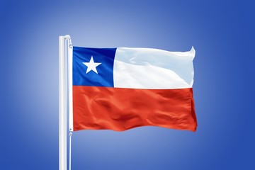 Flag of Chile flying against a blue sky