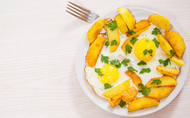 fried eggs with potato