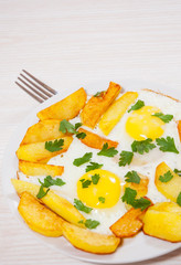 fried eggs with potato