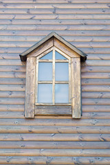 Fototapeta na wymiar window in a wooden house