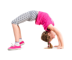 little girl doing the bridge exercise