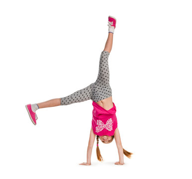 little girl turning handsprings