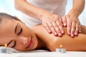 Obraz na płótnie Canvas Attractive woman enjoying relaxing massage.