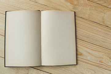 blank paper on wooden table background