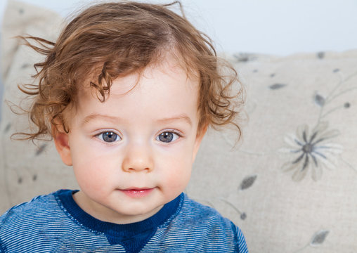 Baby boy with curly hair Stock Photo | Adobe Stock Baby boy with curly hair Stock Photo | Adobe Stock