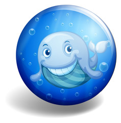 Blue badge with happy whale.