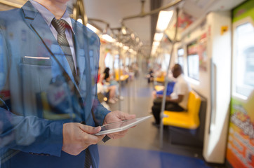 business man holding tablet