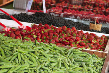 Marketplace with garden truck, vegetables, fruits, berries etc. in Helsinki, Finland