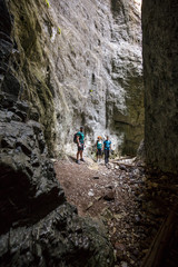 Hikers family in a cave