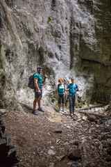 Hikers family in a cave