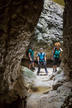 Hikers family in a cave