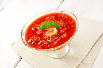 Dessert strawberry-vanilla in glassful on board
