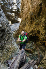Hiker climbing in a canyon