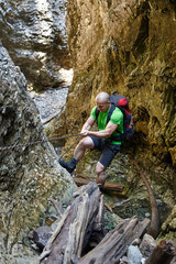 Hiker climbing in a canyon