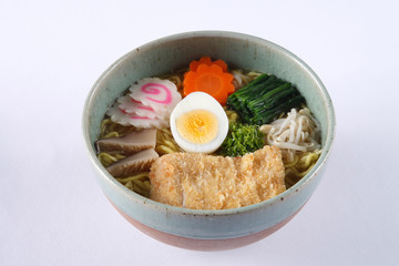 Tonkatsu shoyu ramen isolated on white background, deep fried po