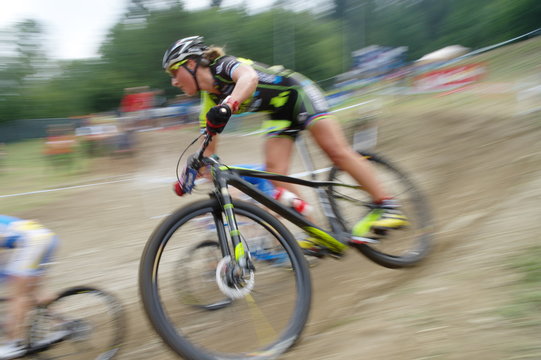 female mountain biker in a xc race