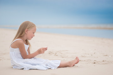 Beautiful young girl on the beach