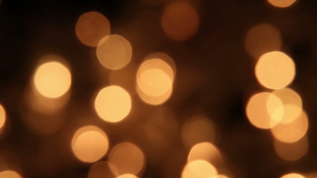 slowly blinking christmas lights bokeh. seamless loop abstract motion background
