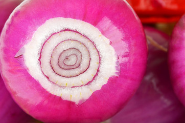 Peeled red onion, close up, as background  DOF