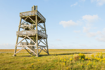 Fototapeta na wymiar Wooden observation tower from close