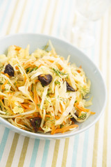 Cabbage with carrot, herbs and prunes