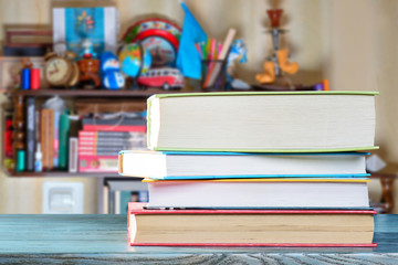 Books on blue table