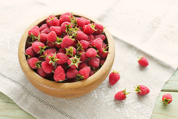 Raspberries in wooden bowl