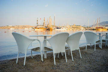 White Dining Chairs and Tables by Aegean Sea