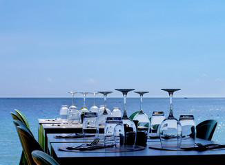 Fototapeta premium Served Restaurant Tables on Sea Coast