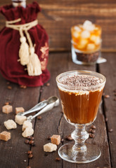 Irish Coffee with coffee beans, whiskey and cream