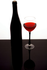 silhouette of a beautiful bottle of wine with a glass
