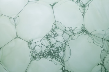 Spherical soap bubbles creating complex shapes