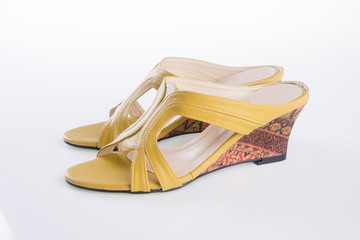 shoe. woman sandal on a background