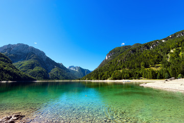Obraz premium Lago del Predil - Friuli Italy / (Predil Lake), beautiful alpine lake in north Italy near the Slovenian border. Julian Alps, Friuli Venezia Giulia, Italy 