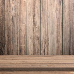 Vintage wood table in wood wall room.