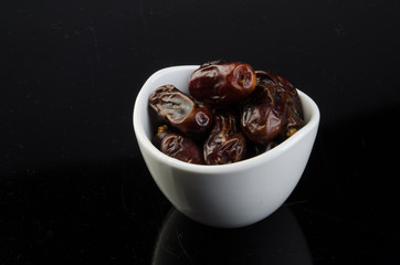 Dates, Dried dates on a background