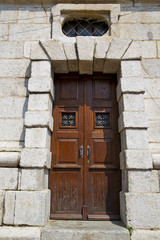 Fototapeta na wymiar door in italy lombardy window closed brick pavement