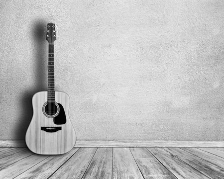 Black and white. Guitar in  white room.