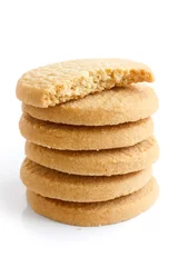 Foto op Plexiglas Stack of round shortbread biscuits isolated on white. Half biscu © Moving Moment