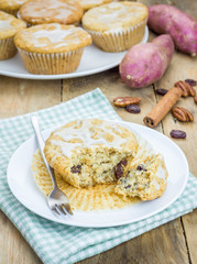 Citrus-glazed sweet potato muffins with pecan nuts and raisins