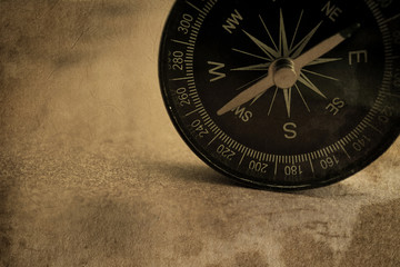 compass in vintage style on mulberry paper texture
