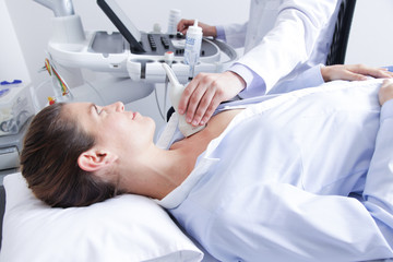 Doctor doing a doppler sonography