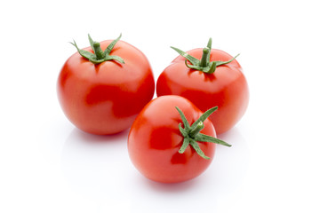 Tomato on the white isolatd background.