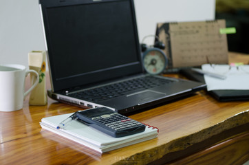 equipment on desktop of businessman in home office