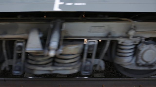 The wheels of a passenger train