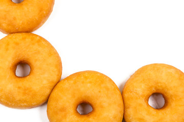 fried equal round doughnuts in frame