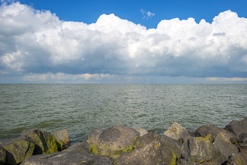 Deteriorating weather above a lake in summer