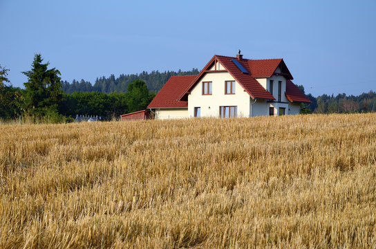 Landscape with  field and house