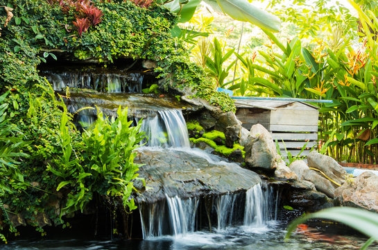 Fototapeta Waterfall in garden design.