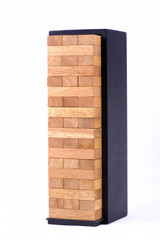 blocks wood game (jenga) with black box isolate
